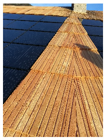 toiture rénovée melèze et photovoltaïque vincent esmieu, charpentier menuisier à Embrun Hautes Alpes - Construction Bois passive ou positive